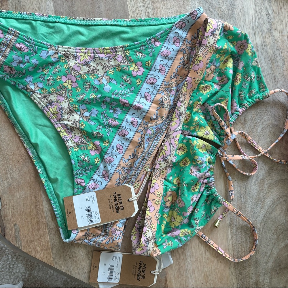 Green and floral billabong swim suit